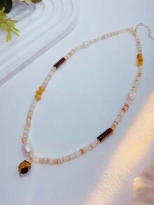 女士珍珠項鏈,珠寶中的理想禮物,時尚飾品,精湛工藝,時尚單品,女神必備,細緻的質感,個性化時尚珠寶,簡約時尚,多用途,修身,優雅,時尚且複雜的時尚元素,適合女性的日常穿著,女士宴會,派對,高貴和優雅,時尚配飾,利基設計,復古而精緻,萬用,輕奢,簡約主義風格。 - 彩色 - 查看 7