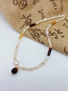 女士珍珠項鏈,珠寶中的理想禮物,時尚飾品,精湛工藝,時尚單品,女神必備,細緻的質感,個性化時尚珠寶,簡約時尚,多用途,修身,優雅,時尚且複雜的時尚元素,適合女性的日常穿著,女士宴會,派對,高貴和優雅,時尚配飾,利基設計,復古而精緻,萬用,輕奢,簡約主義風格。 - 彩色 - 查看 3