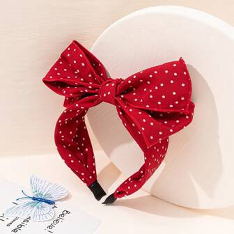 波點蝴蝶結裝飾頭帶，優雅時尚