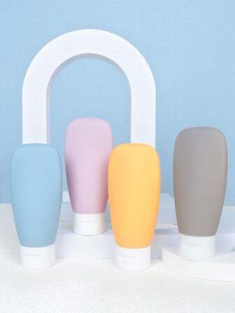 Ensemble de bouteilles de voyage pour articles de toilette, kit de contenants de taille voyage, 4 paquets, portables, étanches, rechargeables, équipements essentiels pour avion : shampooing, après-shampoing, lotion corporelle, gel douche. Décoration pour salon, chambre, salle de bain. Voyages, mariages, fêtes, anniversaires, cadeaux pour hommes, maman, papa, amis, nouvel an, accessoires, cadeaux amusants