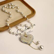 1件精緻的假珍珠鍊心形吊墜項鍊,時尚珠寶鑲嵌假鑽石和假珍珠心型吊墜毛衣鍊女士長項鍊裝飾,百搭服裝配件 - 白色 - 查看 9