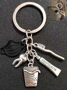 1 pieza Llavero de dentista con combinación de máscara, pasta de dientes y cepillo de dientes, accesorio colgante para bolso, llavero y accesorios de coche - Negro - Ver 1