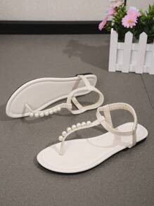 Sandálias femininas romanas de verão, bege, com tira em T e corrente de pérolas, estilo casual minimalista e confortável para praia, estilo moderno e sem cadarço, sandálias com tira elástica (o tamanho dos sapatos é pequeno, sugerimos pedir meio tamanho maior)
