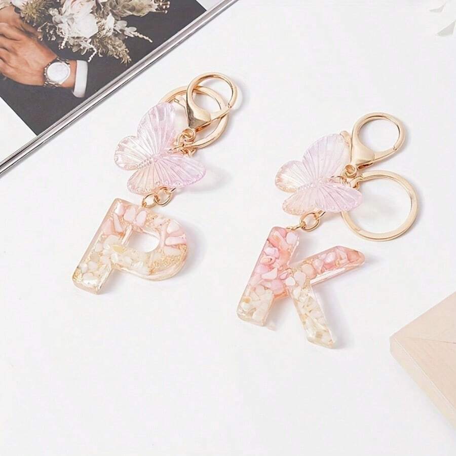 1個中性树脂英文字母鑰匙扣,夢幻蝴蝶吊飾,粉紅色和白色石頭和金箔細節鑰匙扣 - 彩色 - 查看 1