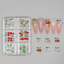 6-Grid Box Containing 24pcs 3D Red Cherry Nail Decorations, DIY Alloy Rhinestone Nail Art Accessories, Valentine's Day Gifts, Gifts For Friends And Girlfriends, Makeup And Styling Supplies, Suitable For Enhancing The Charm Of Women's Nails, Nail Art Supplies, Essential Nail Art Supplies For Nail Artists.