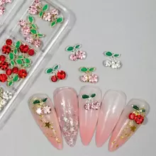 6-Grid Box Containing 24pcs 3D Red Cherry Nail Decorations, DIY Alloy Rhinestone Nail Art Accessories, Valentine's Day Gifts, Gifts For Friends And Girlfriends, Makeup And Styling Supplies, Suitable For Enhancing The Charm Of Women's Nails, Nail Art Supplies, Essential Nail Art Supplies For Nail Artists.