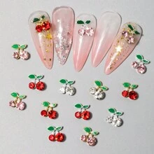 6-Grid Box Containing 24pcs 3D Red Cherry Nail Decorations, DIY Alloy Rhinestone Nail Art Accessories, Valentine's Day Gifts, Gifts For Friends And Girlfriends, Makeup And Styling Supplies, Suitable For Enhancing The Charm Of Women's Nails, Nail Art Supplies, Essential Nail Art Supplies For Nail Artists.
