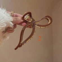 1个精致优雅的发夹，采用独特的镂空蝴蝶结设计，由醋酸纤维制成，适合日常、派对和户外佩戴。是送给品味优雅、个性十足的女孩的理想礼物。 - 彩色 - 查看 9