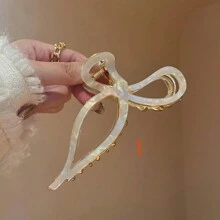 1个精致优雅的发夹，采用独特的镂空蝴蝶结设计，由醋酸纤维制成，适合日常、派对和户外佩戴。是送给品味优雅、个性十足的女孩的理想礼物。 - 彩色 - 查看 8