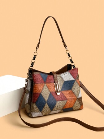 1個復古風格的拼色裝飾托特包,適合女性作為肩袋日常使用