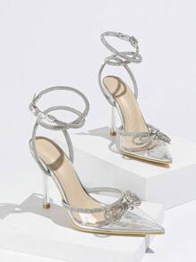 Sandalias de tacón alto con puntera puntiaguda, tiras con moño, talón de cristal transparente y plateado para vestido de fiesta - Plateado - Ver 5