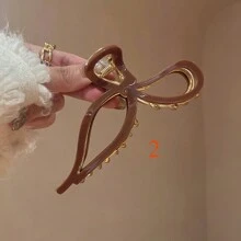 1个精致优雅的发夹，采用独特的镂空蝴蝶结设计，由醋酸纤维制成，适合日常、派对和户外佩戴。是送给品味优雅、个性十足的女孩的理想礼物。 - 彩色 - 查看 3