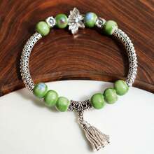 1入組2024年新款蓮花、彎管和流蘇的陶瓷珠手鏈,中性節慶禮物 - 漢苑星 - 查看 3