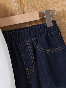 2入套預備期女孩白色針織衫與蝴蝶結印花牛仔裝