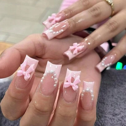 24 piezas de uñas postizas de diseño clásico con punta francesa blanca, cuadrado largo con lazo rosa 3D y perlas de estilo dulce. Set de uñas falsas con diseño reutilizable y pegamento en gel suave en 12 tamaños, que contiene 1 tubo de pegamento gelatinoso y 1 lima. Ideal para suministros de uñas para mujeres y niñas para hacer arte en las uñas. uñas falsas uña falsa uña acrílica