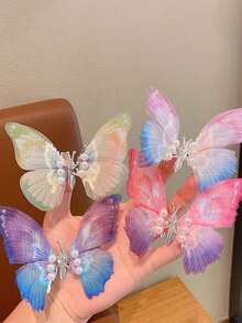 1入組會移動的蝴蝶髮夾,漸變效果,女孩髮飾