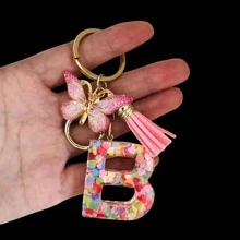 1个女士字母钥匙扣，心形闪光树脂字母，蝴蝶吊坠和流苏，新颖的背包挂件，情人节汽车配饰包包挂饰，学校万圣节配饰，教师节圣诞节礼物创意，带证件夹的挂绳，汽车配饰包包挂饰，送给母亲、父亲、毕业生和老师的礼物 - 粉色 - 查看 27