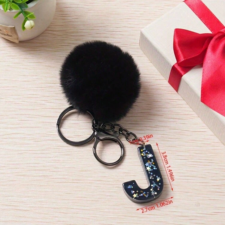 1 pieza Llavero con inicial de alfabeto, llavero de pompón de peluche lindo, llavero de resina con lentejuelas brillantes, colgante para bolsa, mochila, coche, accesorios para billetera y bolso, llavero con borlas, llavero de peluche con inicial de alfabeto A-Y - Negro - Añade 24