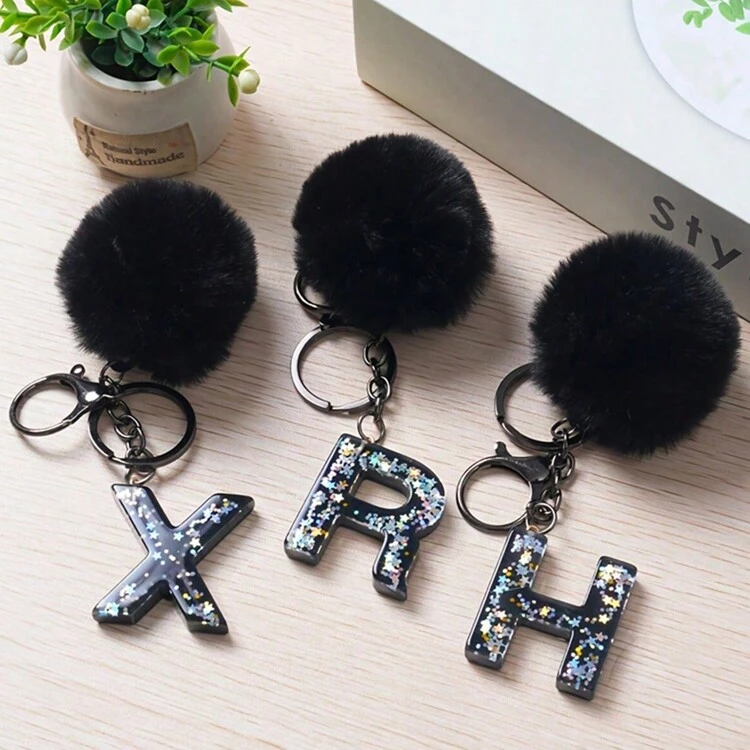 1 pieza Llavero con inicial de alfabeto, llavero de pompón de peluche lindo, llavero de resina con lentejuelas brillantes, colgante para bolsa, mochila, coche, accesorios para billetera y bolso, llavero con borlas, llavero de peluche con inicial de alfabeto A-Y - Negro - Añade 7