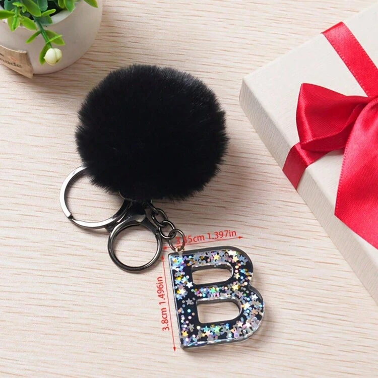1 pieza Llavero con inicial de alfabeto, llavero de pompón de peluche lindo, llavero de resina con lentejuelas brillantes, colgante para bolsa, mochila, coche, accesorios para billetera y bolso, llavero con borlas, llavero de peluche con inicial de alfabeto A-Y - Negro - Añade 16