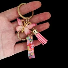 1个女士字母钥匙扣，心形闪光树脂字母，蝴蝶吊坠和流苏，新颖的背包挂件，情人节汽车配饰包包挂饰，学校万圣节配饰，教师节圣诞节礼物创意，带证件夹的挂绳，汽车配饰包包挂饰，送给母亲、父亲、毕业生和老师的礼物 - 粉色 - 查看 20