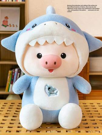 藍色鯊鯊-豬的變形填充絨毛玩具娃娃,可愛柔軟的豬娃娃也可以用作收藏品,卡通舒適的枕頭和搭配用品,是情人節、生日或喜歡可愛動物的朋友的理想禮物。