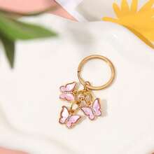 1入組女士滴油鑲鑽金邊蝴蝶粉色鑰匙扣掛墜,可愛優雅的漫畫包飾配件,適用於日常使用,可作為情人節、母親節、感恩節和紀念日的小驚喜禮物 - 粉色 - 查看 3