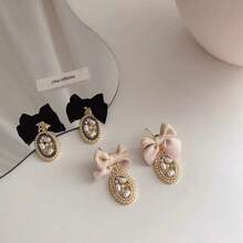 2入組法式復古風格布結和淡水珍珠裝飾的優雅細緻耳環,適用於甜美可愛的造型 - 蝴蝶型 - 查看 1