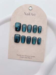 你好,使用 10入組高端私人訂製貓眼手工美甲貼片,帶有貓咪願望、煙火、閃亮和追光貓眼效果,升級你的美甲造型。附帶1個膠帶和1個美甲檔 - 無色 - 查看 6