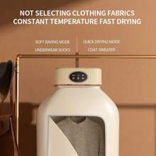 1 件高溫消毒便攜式伸縮折疊乾衣機,插頭電壓 100-240v,適合家庭使用和旅行,粉紅色