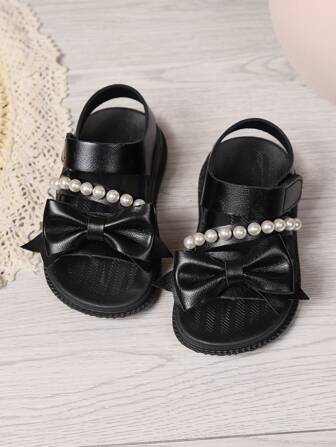 1 Pair Girls Faux Pearl & Bowknot Decor PU Leather Soft Bottom Flat Sandals, Cute Style For Summer
