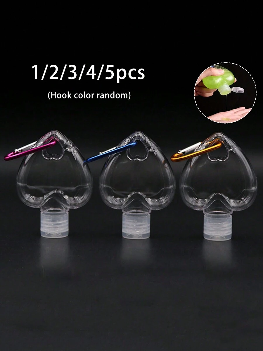 50ML空心形设计扣式乳液瓶，旅行容器，便携式翻盖挂钩瓶，可再填充化妆品容器空洗发水沐浴露管用于洗漱用品洗发水和沐浴露液体旅行瓶乳液分瓶可挤压容器50ml（挂钩颜色随机）旅行必需品学校学校用品节日露营节日必需品度假配件迷你女士香水男士香水海滩 - 無色 - 查看 1