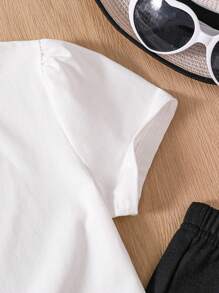 Conjunto de camiseta de manga corta con estampado gráfico de corazón y pantalones acampanados para niña - Blanco - Ver 2