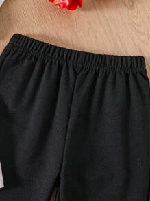 Conjunto de camiseta de manga corta con estampado gráfico de corazón y pantalones acampanados para niña - Blanco - Ver 3