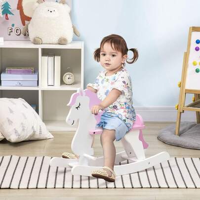 Cavalo de balanço HOMCOM para crianças de 1 a 3 anos Cavalo de balanço de madeira com guiador e pedais Carga 50 kg 68x27x46,5 cm Branco e rosa