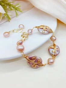 A Classic Baroque Style Faux Pearl Bracelet With Elegant Pink Tone, Suitable For Daily Outfits, Parties, And Other Formal Occasions. Suitable For Women, It Is Stylish And Fashionable. It Features Exquisite And Retro Design, Perfect Match For Various Styles Such As Cold, Light Luxury, And Workplace. A Great Accessory For Mother's Day Gift, Graduation Ceremony, And For Friends