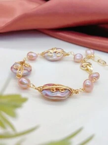 A Classic Baroque Style Faux Pearl Bracelet With Elegant Pink Tone, Suitable For Daily Outfits, Parties, And Other Formal Occasions. Suitable For Women, It Is Stylish And Fashionable. It Features Exquisite And Retro Design, Perfect Match For Various Styles Such As Cold, Light Luxury, And Workplace. A Great Accessory For Mother's Day Gift, Graduation Ceremony, And For Friends