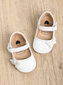 1 coppia Scarpe PU per bambine, con nodo a fiocco di colore solido, chiusura a gancio e anello, suola morbida antiscivolo adatta per bambini da 0-18 mesi, stile principessa elegante e atmosferico, perfetto per la stagione primavera e autunno