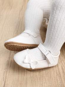 1 coppia Scarpe PU per bambine, con nodo a fiocco di colore solido, chiusura a gancio e anello, suola morbida antiscivolo adatta per bambini da 0-18 mesi, stile principessa elegante e atmosferico, perfetto per la stagione primavera e autunno