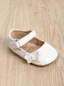 1 coppia Scarpe PU per bambine, con nodo a fiocco di colore solido, chiusura a gancio e anello, suola morbida antiscivolo adatta per bambini da 0-18 mesi, stile principessa elegante e atmosferico, perfetto per la stagione primavera e autunno