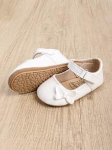 1 coppia Scarpe PU per bambine, con nodo a fiocco di colore solido, chiusura a gancio e anello, suola morbida antiscivolo adatta per bambini da 0-18 mesi, stile principessa elegante e atmosferico, perfetto per la stagione primavera e autunno