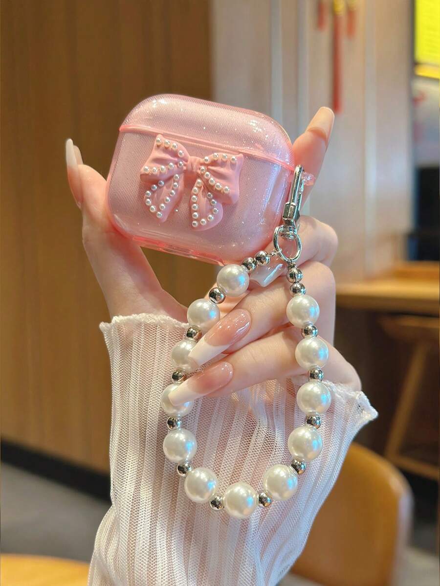 苹果婴儿粉色透明闪光耳机盒配蝴蝶结和仿珍珠链