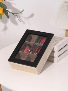 Une boîte à thé en bois avec des compartiments pour les sachets de thé et les paquets de café, avec un couvercle en verre transparent. Idéal pour la rentrée scolaire