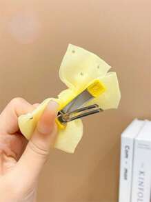 2 kẹp tóc nơ đính ngọc trai giả nhiều màu cho bé gái - Màu vàng - Xem 6