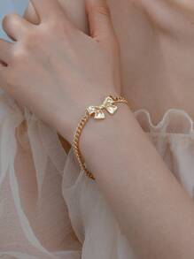 1 Pieza Pulsera De Metal Dulce Con Decoración De Lazo, Suave Y Elegante, Adecuada Para El Uso Diario De Las Mujeres - Amarillo Oro - Ver 2