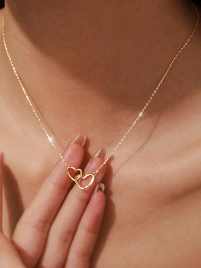 ELSEDES 这款时尚简约的 S925 银双环心形吊坠项链散发着美丽浪漫的魅力，适合女性日常或约会佩戴，是送给女朋友、婚礼、订婚或作为新娘珠宝的完美礼物。