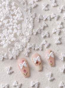 50 stks/zak Witte Hars 3D Strik Strass Y2K Nail Art Decoratie - Geweldig Voor DIY Platte Achterkant Eenvoudige Nail Art Ontwerpen En Accessoires - 3D Strik Voor Vrouwen Casual Nail Art Decoraties En Accessoires Nagel Charmes Nagel Gems Nagelbenodigdheden