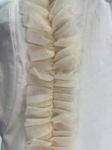 Letnia sukienka w jednolitym kolorze z siateczki dla młodych dziewcząt, z bufiastymi rękawami