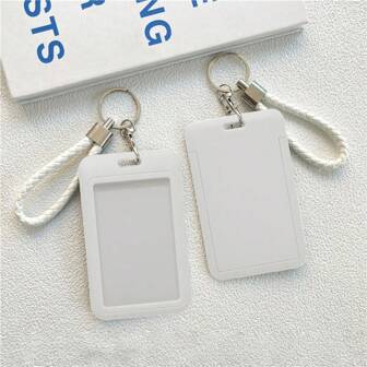 1个马卡龙色ABS卡通风格推拉卡包。可用作学生腕带卡包、公交卡包、校园身份保护套等，学校用品，返校季