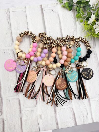 1 件女款豹纹串珠手链，带钥匙扣、流苏、饰物和圆形木片 - 适用于手提包、钥匙和配饰。非常适合送给妈妈、朋友和情侣的汽车配饰包饰背包，适合上学、可爱哥特风 Y2k 万圣节配饰、教师节、圣诞节礼物创意包袋挂绳（带身份证夹）、汽车配饰包饰